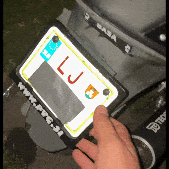 FoldMoto Flip Plate – Upward Folding Motorcycle License Plate Bracket | Fits 50cc Bikes & Plate Frames